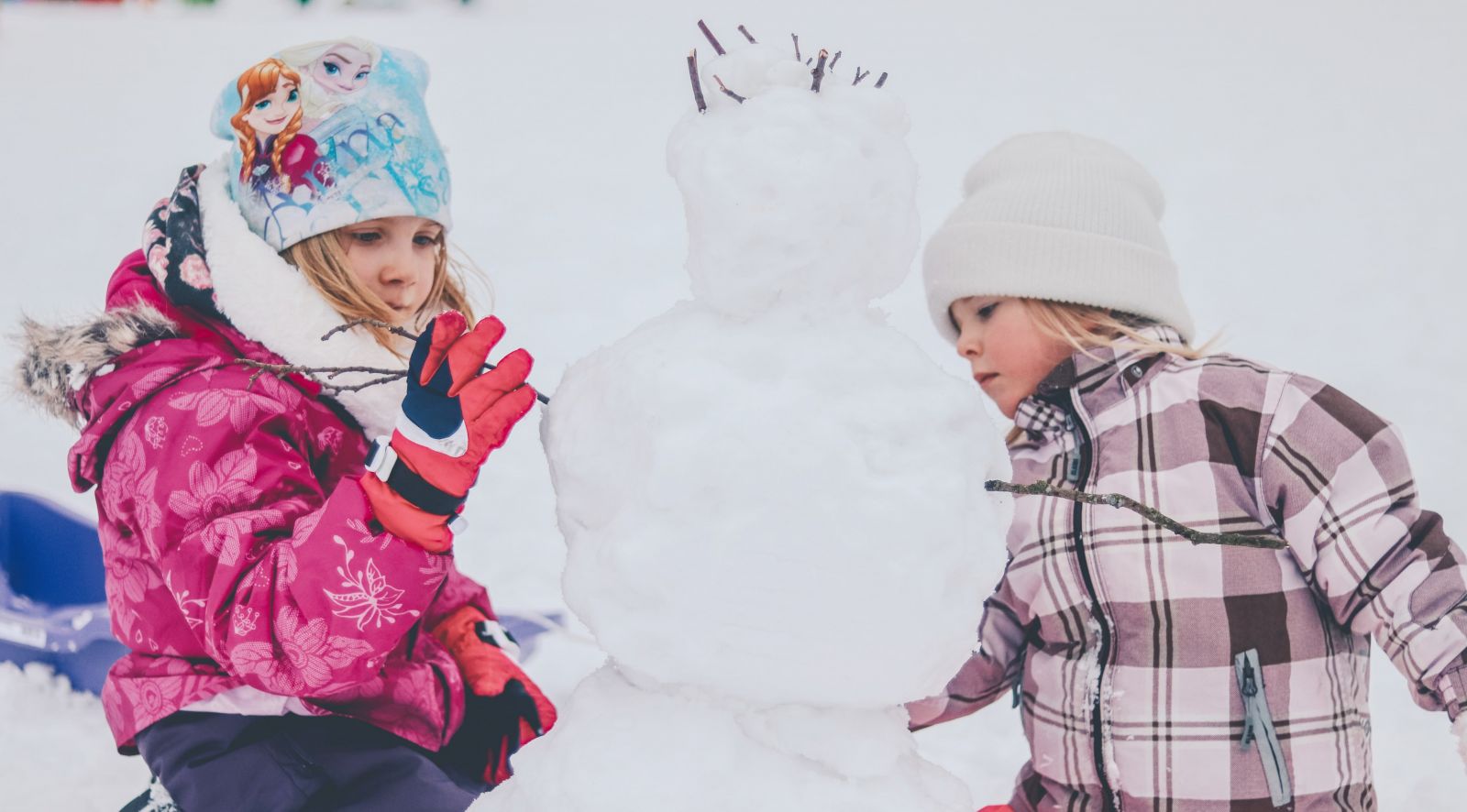 Kids building a Snowman